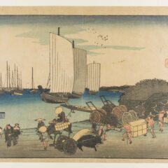 View of a sea front with people pulling cards and goods across the land