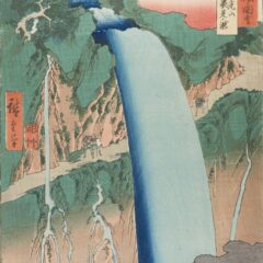 View of a waterfall and mountain side.